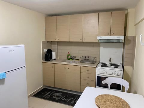 Kitchen or kitchenette, oven, stove