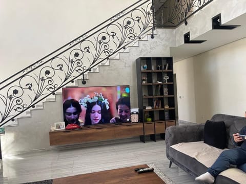 Communal lounge/ TV room, TV and multimedia, Living room, Seating area, group of guests