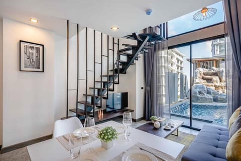 Living room, Seating area, Pool view
