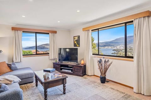 The Lookout with City water and Mountain views House in Bellerive