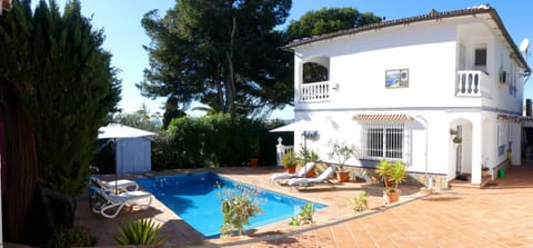 Property building, Living room, Swimming pool