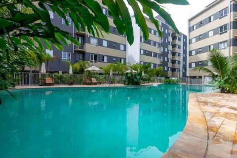 Property building, Garden, Pool view, Swimming pool, sunbed
