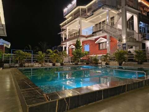 Property building, Night, Pool view, Swimming pool