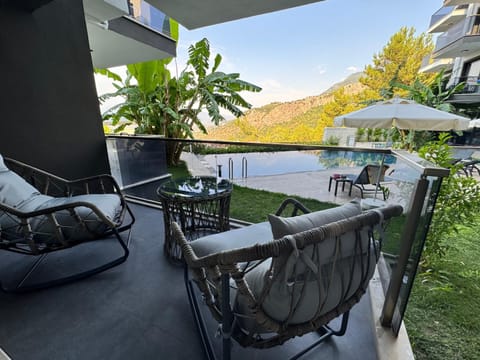 Patio, Day, Natural landscape, Garden, View (from property/room), Balcony/Terrace, Seating area, Garden view, Mountain view, Pool view, Swimming pool, sunbed