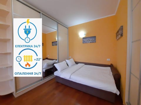 Bed, Property logo or sign, Photo of the whole room, Logo/Certificate/Sign, Bedroom, Text overlay, Certificate/Award
