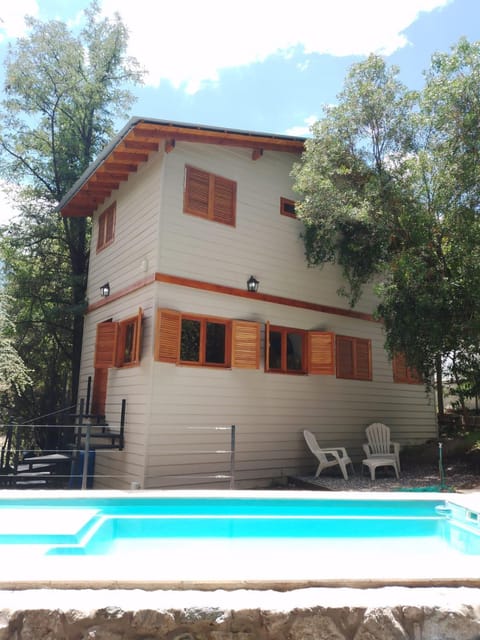 Property building, Patio, Spring, Natural landscape, Pool view, Swimming pool