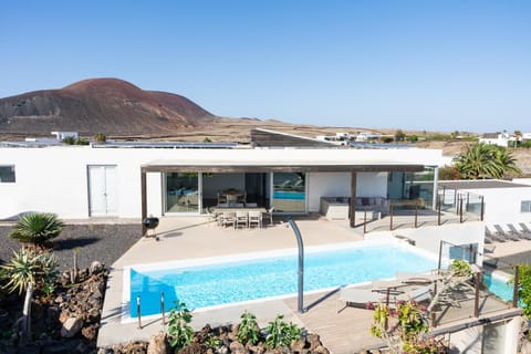 Property building, Patio, Natural landscape, Pool view