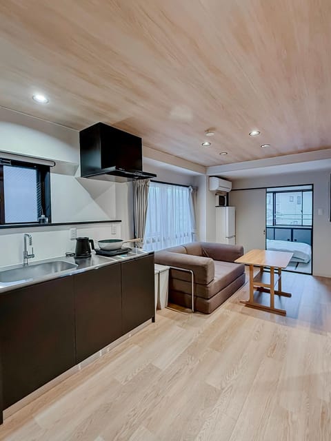 Kitchen or kitchenette, Living room, Photo of the whole room, Seating area, Dining area, stove