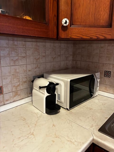 Kitchen or kitchenette, microwave