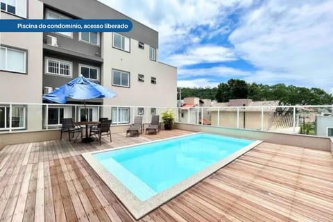 Property building, Day, View (from property/room), Pool view, Swimming pool, sunbed