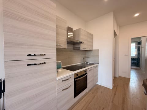 Kitchen or kitchenette, dishwasher, stove