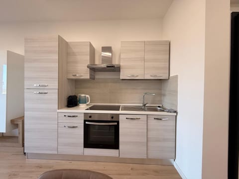Kitchen or kitchenette, stove