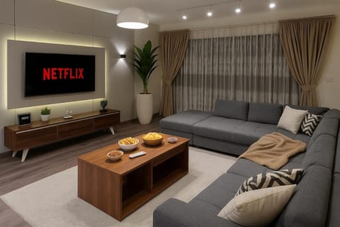 Communal lounge/ TV room, TV and multimedia, Living room, Food and drinks, Seating area, Evening entertainment, Food