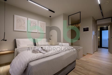 Bed, Photo of the whole room, Bedroom, flat iron, towels, wardrobe