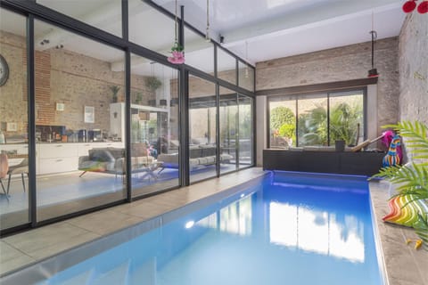 Property building, Living room, Swimming pool
