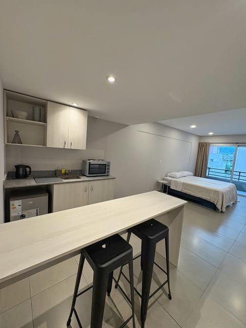 Photo of the whole room, oven, stove