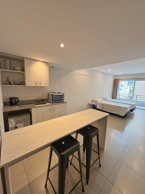 Photo of the whole room, oven, stove