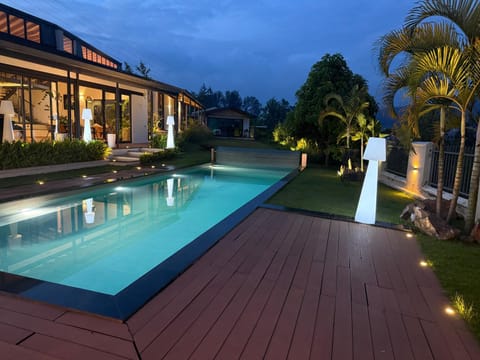Property building, Night, Garden, Garden view, Pool view, Swimming pool