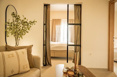 Bed, Living room, Seating area, Bedroom