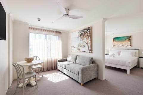 Bed, TV and multimedia, Living room, Seating area