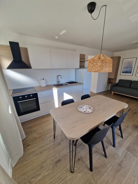 Kitchen or kitchenette, oven, stove