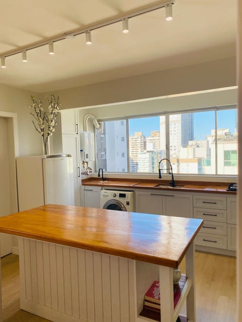 Kitchen or kitchenette, dishwasher, oven, stove