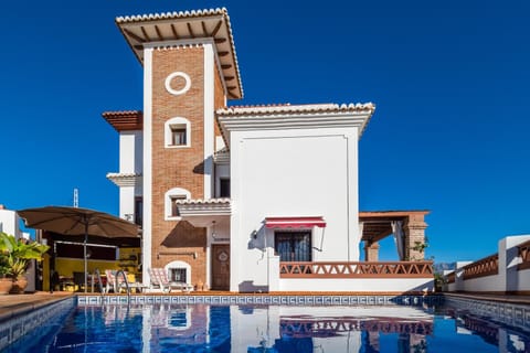 Property building, Living room, Swimming pool