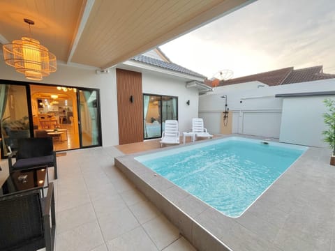 Patio, Day, Natural landscape, Pool view, Swimming pool, sunbed