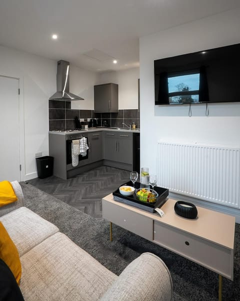 TV and multimedia, Kitchen or kitchenette, Living room, Seating area, oven, stove