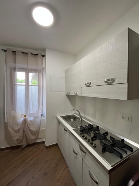 Kitchen or kitchenette, stove