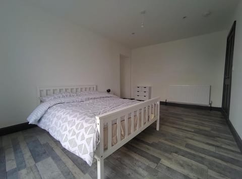 Bed and Blue by the Beach House in The Mumbles