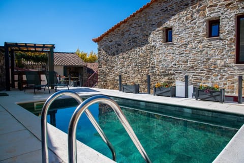 Property building, Living room, Swimming pool