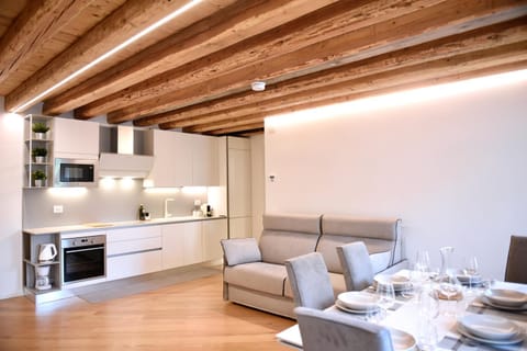 Kitchen or kitchenette, Living room, Seating area, Dining area