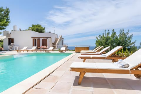 Property building, Living room, Swimming pool