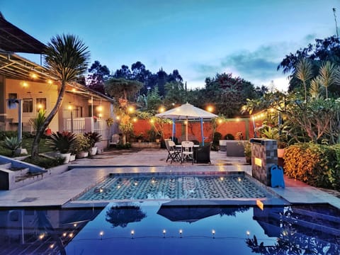 Property building, Patio, Day, Natural landscape, Garden, Garden view, Pool view, Swimming pool