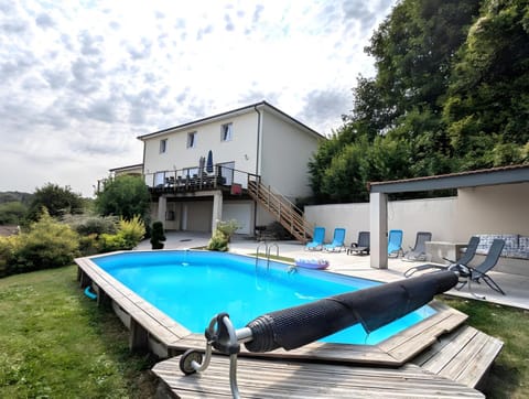 Property building, Living room, Swimming pool