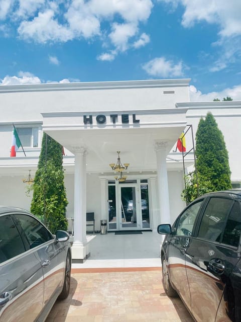 Property building, Facade/entrance, Day, Parking