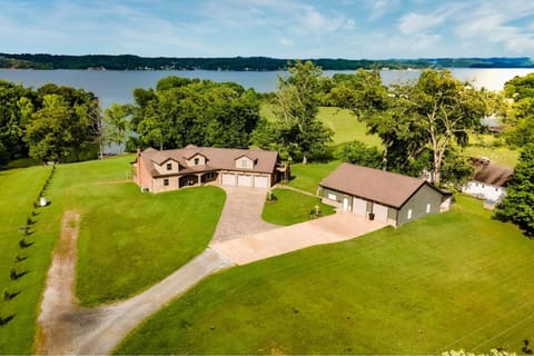 Exclusive Attraction Ticket Prices! Beautiful Lake Front Estate with Dock House in Douglas Lake