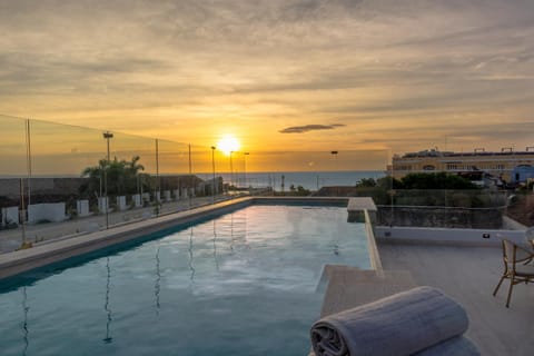 Day, Natural landscape, Pool view, Sea view, Swimming pool, Sunrise, Sunset, sunbed