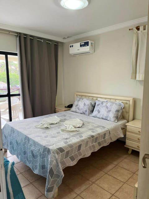 Bed, Photo of the whole room, Bedroom, towels, air conditioner