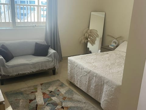 Bed, Seating area, Bedroom