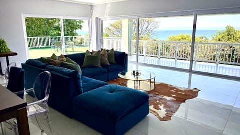 View (from property/room), Living room, Seating area, Sea view