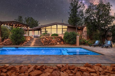 Property building, Patio, Natural landscape, Pool view, Swimming pool