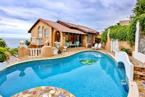 Property building, Patio, Day, Natural landscape, Pool view, Sea view, Swimming pool, sunbed