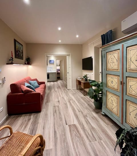 Bed, TV and multimedia, Living room, Seating area, wardrobe, air conditioner