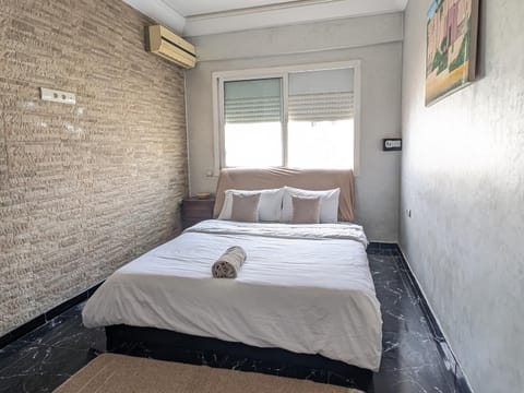 Bed, Photo of the whole room, Bedroom, towels, air conditioner