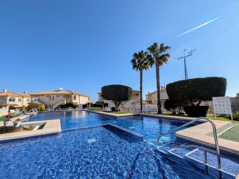 Property building, Living room, Swimming pool