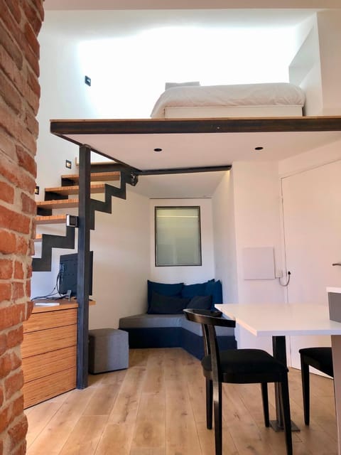 Property building, Living room, Seating area, Bedroom