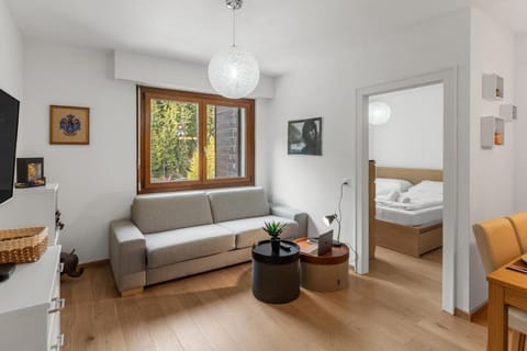 Bed, View (from property/room), Living room, Seating area, Bedroom