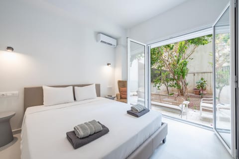Bed, Photo of the whole room, Bedroom, towels, air conditioner